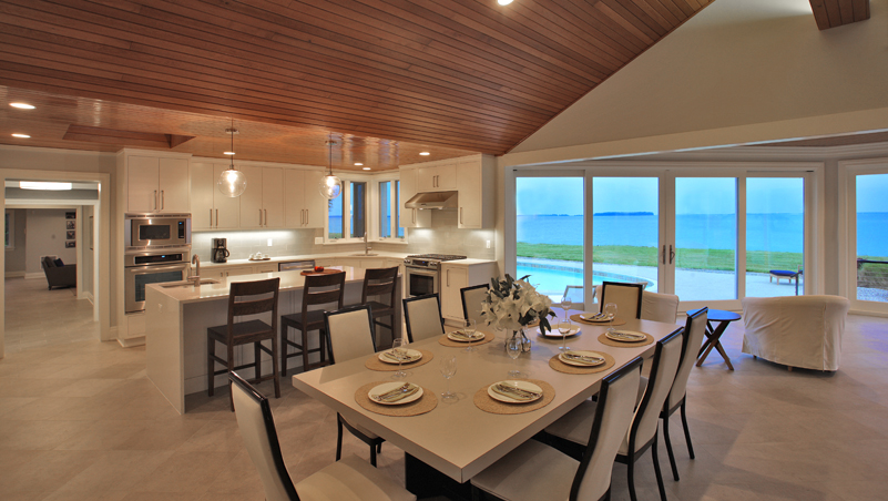 Dining room and kitchen of a renovated luxury modern home on the Maryland Eastern Shore