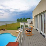 Deck overlooking pool of renovated modern home on the Maryland Eastern Shore